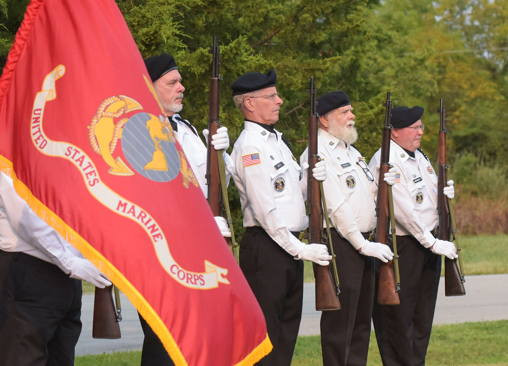 Veterans prepare to shoot a rifle volley during the American Legion Post 202’s remembrance ceremony for 9/11